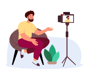 Un homme qui parle devant une caméra pour expliquer comment fonctionne un site web